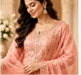 Peach embroidered unstitched suit on a model